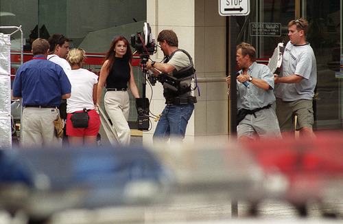 | Tribune File Photo
Police enforcement are often on the set of movies - such as this scene from Touched By An Angel.