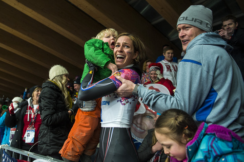 KRASNAYA POLYANA, RUSSIA  - JANUARY 14:
Noelle Pikus-Pace celebrates with her family; son Traycen, 2, daughter Lacee, 6, husband Janson, right, after winning the silver medal in the women's skeleton competition at Sanki Sliding Center during the 2014 Sochi Olympics Friday February 14, 2014. Pikus-Pace finished with a time of 3:53.86.
(Photo by Chris Detrick/The Salt Lake Tribune)