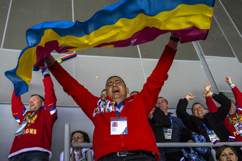SOCHI, RUSSIA  - JANUARY 15:
Russian fans cheer after a goal during the game at Bolshoy Ice Dome during the 2014 Sochi Olympics Saturday February 15, 2014. 
The United States men's hockey team defeated Russia with a 3-2 overtime victory.
(Photo by Chris Detrick/The Salt Lake Tribune)