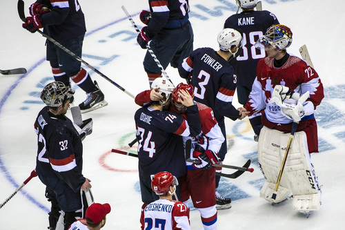 SOCHI, RUSSIA  - JANUARY 15:
United States' T.J. Oshie hugs Russia's Vladimir Tarasenko (91) after winning the game in an overtime shootout against Russia at Bolshoy Ice Dome during the 2014 Sochi Olympics Saturday February 15, 2014. 
The United States men's hockey team defeated Russia with a 3-2 overtime victory.
(Photo by Chris Detrick/The Salt Lake Tribune)