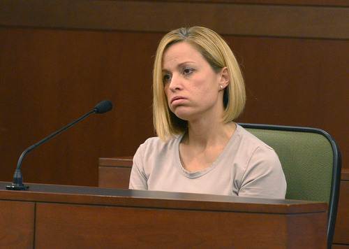 Leah Hogsten  |  The Salt Lake Tribune
Dea Millerberg testifies against her husband, Eric Millerberg, Wednesday, February 12, 2014 in 2nd District Court. Eric Millerberg is accused in the 2011 drug-related death of his children's 16-year-old baby sitter. Millerberg, 38, of North Ogden, is charged with first-degree felony child-abuse homicide in the September 2011 death of Alexis "Lexi" Rasmussen. He also is charged with felony counts of obstructing justice, desecrating a body and having unlawful sexual activity with a minor.