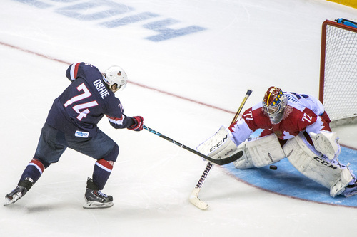 SOCHI, RUSSIA  - JANUARY 15:
United States' T.J. Oshie shoots past Russia's Sergei Bobrovski (72) during an overtime shootout against Russia at Bolshoy Ice Dome during the 2014 Sochi Olympics Saturday February 15, 2014. The United States men's hockey team defeated Russia with a 3-2 overtime victory.
(Photo by Chris Detrick/The Salt Lake Tribune)