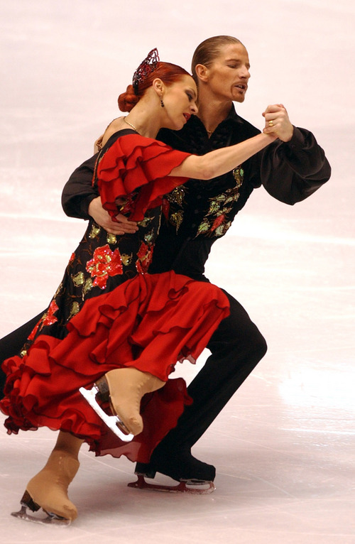 Rick Egan  |  Tribune file photo
Marina Assina and  Gwendal Peizerat perform in the ice dance competition of the 2002 Winter Olympics.