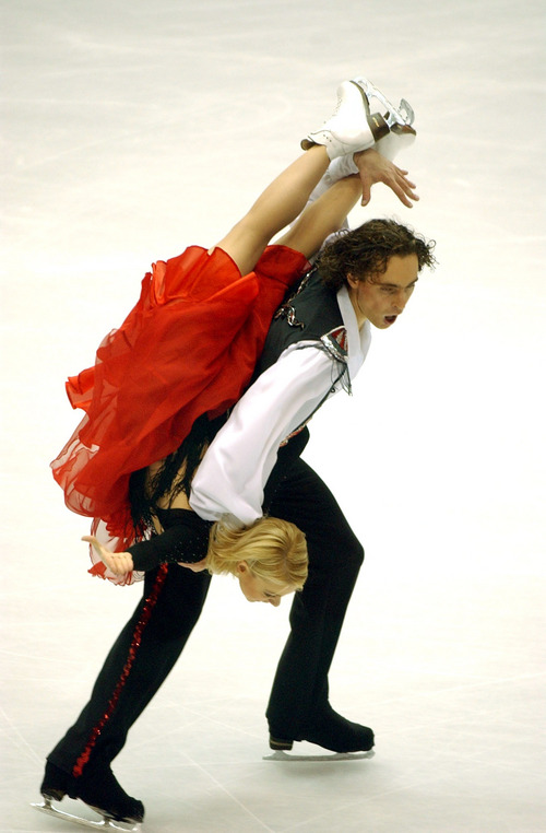 Rick Egan  |  Tribune file photo
Elena Grushina and Ruslan Goncharov compete in the ice dancing during the 2002 Winter Olympics.