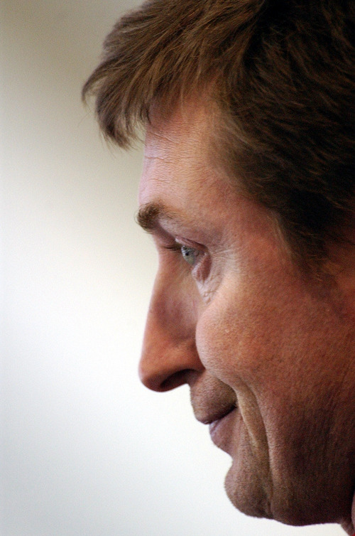 Danny La | Tribune file photo
Wayne Gretzky, Team Canada's general Manager, watches Canada beat Germany 3-2 during the 2002 Winter Olympics.