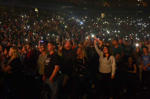 Rick Egan  | The Salt Lake Tribune 

Fans hight up their cell phones, during The Road Show 2014, at the Maverick Center, Sunday, February 16, 2014.
