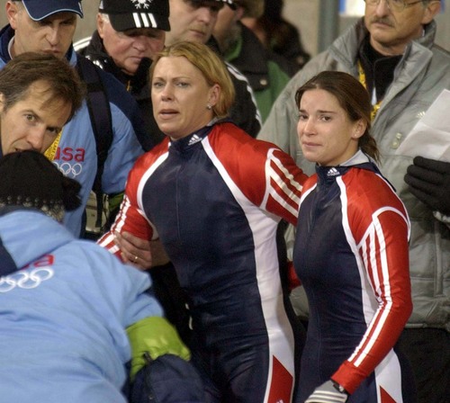 Trent Nelson | Tribune file photo
Gea Johnson and Jean Racine leave the finish area of the women's bobsled during the 2002 Olympic Winter Games.