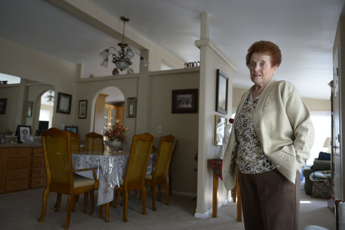 Francisco Kjolseth  |  The Salt Lake Tribune
Ann Sharp, 81, an 11-year resident of Applewood Park in Midvale stands in her 1700-square-foot manufactured as she talks about the challenges of seeing rents go up since the place was sold to Ivory Homes. According to a Midvale memorandum, the developer plans to build an apartment complex on the eight-acre parcel.