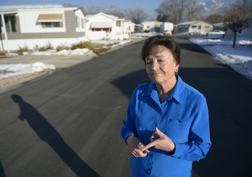 Francisco Kjolseth  |  The Salt Lake Tribune
Shirlene Stoven, 77, a 20-year resident of the Applewood Park manufactured home complex in Midvale becomes emotional as she thinks about her elederly neighbors who can't fight a possible eviction after finding out plans for 186 apartments to be built on the nearly ight acres of land where she currently lives. Stoven becomes angry when people refer to her home as a mobile home and says "there are no wheels on my manufactured home, it can't be driven away." The people who own the 56  homes have seen their rents go up since the place was sold to Ivory Homes. According to a Midvale memorandum, the developer plans to build an apartment complex.