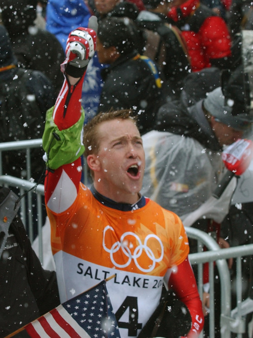 Rick Egan | Tribune file photo
Jim Shea of the United States, acknowledges the cheering crowd after winning the gold medal in the skeleton during the 2002 Winter Olympics.
