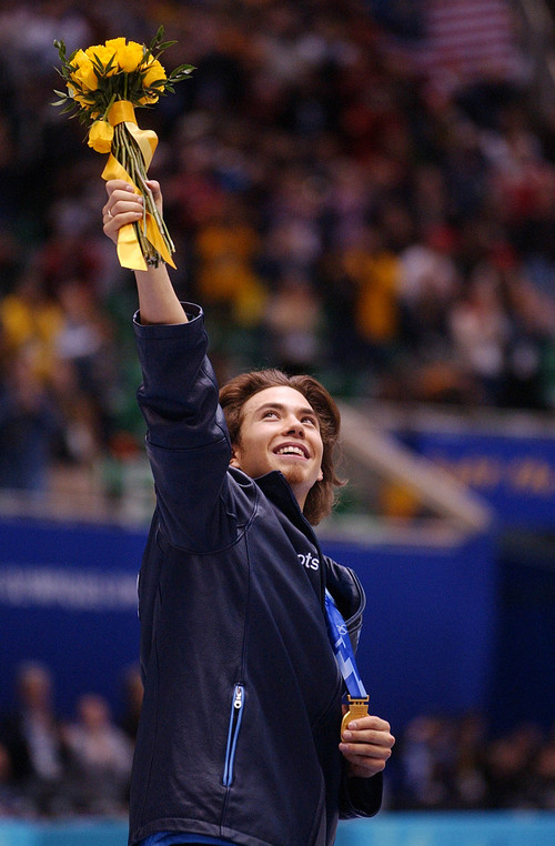 | Tribune file photo
Apolo Anton Ohno aknowledges the crowd after winning his gold medal in the Men's 1500M race at the Salt Lake Ice Center in short track on Wednesday, Feb. 20, 2002.