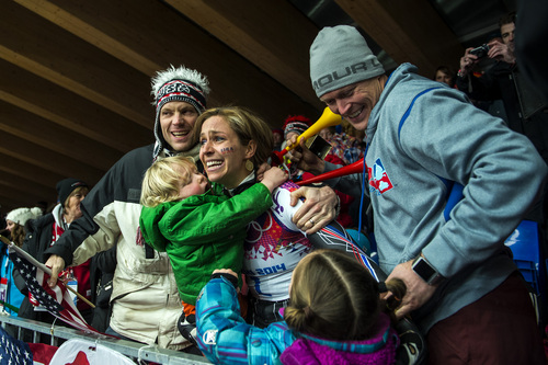 KRASNAYA POLYANA, RUSSIA  - JANUARY 14:
Noelle Pikus-Pace celebrates with her family; son Traycen, 2, daughter Lacee, 6, husband Janson, right, and her brother Jared Pikus, left, after winning the silver medal in the women's skeleton competition at Sanki Sliding Center during the 2014 Sochi Olympics Friday February 14, 2014. Pikus-Pace finished with a time of 3:53.86.
(Photo by Chris Detrick/The Salt Lake Tribune)