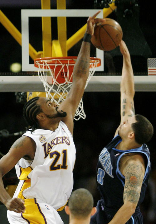 Ronny Turiaf (21)  blocks a shot by Deron Williams in NBA playoff action, Game one at the Staples Center in Los Angeles May 4,  2008   Rick Egan/TheSalt Lake Tribune   5/4/08