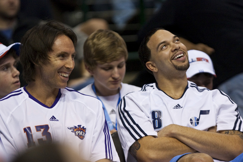 Photo by Chris Detrick  |  The Salt Lake Tribune

Deron Williams and Steve Nash talk before the NBA All-Star Skills Competition at the American Airlines Center Saturday. Williams finished in second place behind Steve Nash.