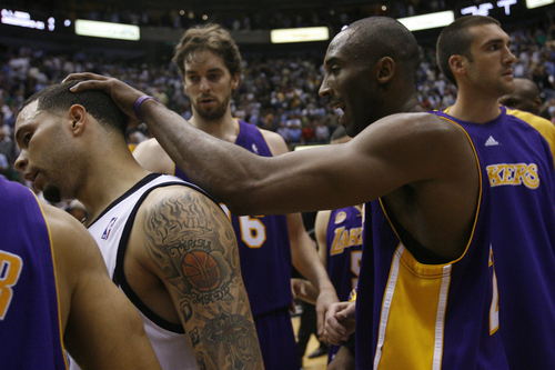 Lakers' guard Kobe Bryant tries to embrace Jazz guard Deron Williams after L.A. eliminated the Jazz in Game 6 of the Western Conference playoffs at EnergySolutions Arena in Salt Lake City, Utah, on Friday, May 16, 2008. 
 
Photo by Chris Detrick/The Salt Lake Tribune