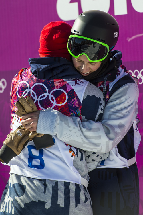 KRASNAYA POLYANA, RUSSIA  - JANUARY 13:
Joss Christiensen hugs Gus Kenworthy after winning the men's ski slopestyle competition at Rosa Khutor Extreme Park during the 2014 Sochi Olympics Thursday February 13, 2014. Joss Christiensen, of Park City, Utah, won the gold medal with a score of  95.80. Gus Kenworthy, of Telluride, Colo., won the silver with a 93.60. Nick Goepper, of Lawrenceburg, Ind., won the bronze with a 92.40. It marked only the third time that the United States has swept the medals in an Olympic Winter Games event.
(Photo by Chris Detrick/The Salt Lake Tribune)