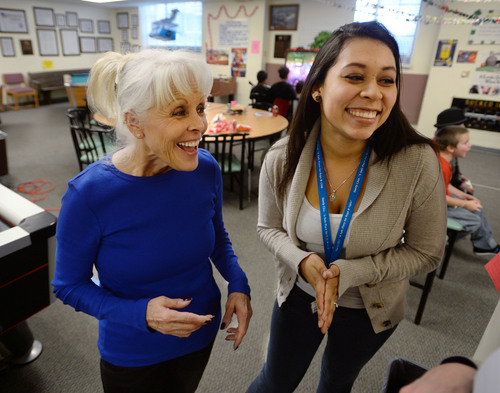 Steve Griffin  |  The Salt Lake Tribune

Linda Martinez Saville, left, with 19-year-old employee Lilibeth Galeana at the Sandy Club, a Safe Place for Boys and Girls in  Sandy. Galeana has been coming to the club since she was 6, started volunteering at 13 and now works there. Because the club is bursting at the seams in its current location, the nonprofit has purchased land in the city's historic district to build a new center.  Some neighbors complain the new center will be too big, bring in too much traffic and lack enough parking. Supporters say the club will benefit Sandy's children and the neighborhood.