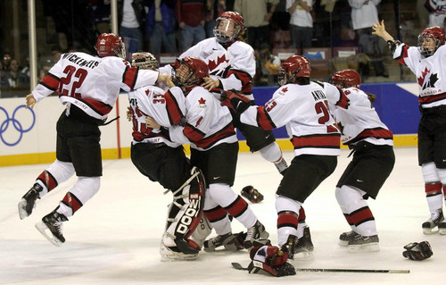 |  Tribune file photo

Canada celebrates its gold medal win over the U.S. at the E Center. Canada beats the USA by a score of 2-3 to capture the gold medal.