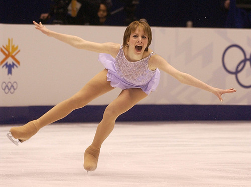 | Tribune file photo
Sarah Hughes of the United States expresses her excitement at landing a jump during the Ladies Free Skate at the Salt Lake Ice Center on Thursday, Feb. 21, 2002.