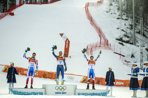 KRASNAYA POLYANA, RUSSIA  - JANUARY 19:
Men's giant slalom winners, from left, France's Steve Missillier (silver), United States' Ted Ligety (gold) and France's Alexis Pinturault (bronze) participate in the flower ceremony at Rosa Khutor Alpine Center during the 2014 Sochi Olympics Wednesday February 19, 2014. LIgety won the gold medal with a cumulative time of 2:45.29.
(Photo by Chris Detrick/The Salt Lake Tribune)
