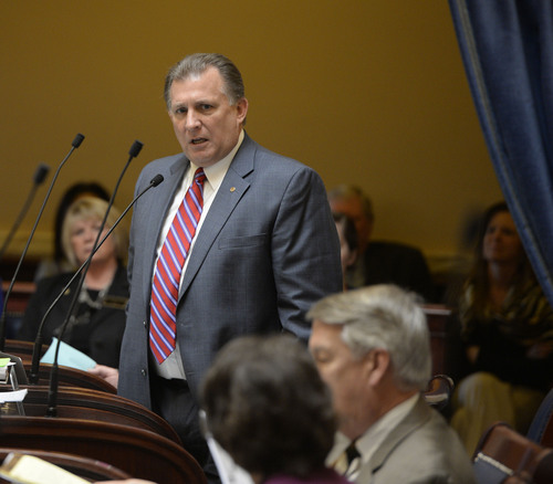 Al Hartmann  |  The Salt Lake Tribune
Senator Curtis Bramble, R-Provo sponsor of SB 54 Election Amendments, speaks on the senate floor during debate Thursday February 20.