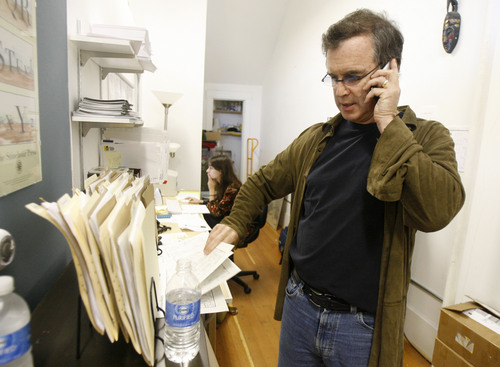 Tribune file photo
Doonesbury cartoonist Garry Trudeau, shown here in 2007 checking faxes of his comic strip sent to his editor, has announced he will take a hiatus from producing a daily strip to spend time writing and producing "Alpha House."