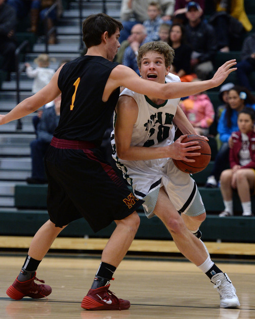 Steve Griffin  |  The Salt Lake Tribune


Alec Monson, of Olympus, tries to drive past Mountain View's Manuel Ortiz during game at Olympus High School in Salt Lake City, Utah Tuesday, February 18, 2014.
