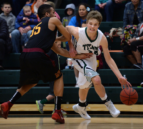 Steve Griffin  |  The Salt Lake Tribune


Alec Monson, of Olympus, drives past Mountain View's Charlie Barksdale during game at Olympus High School in Salt Lake City, Utah Tuesday, February 18, 2014.