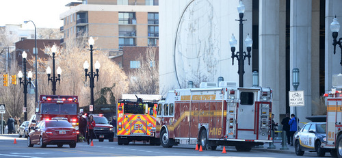 Steve Griffin  |  The Salt Lake Tribune


 Salt Lake City Fire and Police Department vehicles in position outside the LDS Church Office Building in downtown Salt Lake City, Utah Friday, February 21, 2014 after white powder was found in an envelope inside the building.