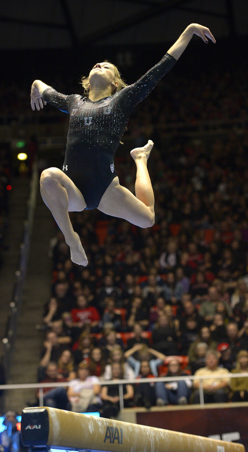 Rick Egan  | The Salt Lake Tribune 

Mary Beth Lofgren competes on the beam for the Utes, in Pac12 gymnastics competition, Utah vs. UCLA, at the Huntsman Center, Saturday, January 25, 2014.