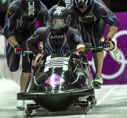 KRASNAYA POLYANA, RUSSIA  - JANUARY 22:
Night Train 2, piloted by Steven Holcomb and pushed by Chris Fogt, Curtis Tomasevicz, Steve Langton, compete in the four-man bobsled at Sanki Sliding Center during the 2014 Sochi Olympics Saturday February 22, 2014. After the first run, they are in third place with a time of 54.89. 
(Photo by Chris Detrick/The Salt Lake Tribune)