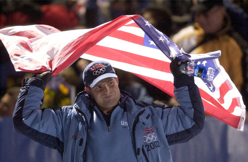 Trent Nelson  |  Tribune file photo
Mike Kohn, part of Brian Shimer's USA-2 team, celebrates a bronze medal during the 2002 Salt Lake Games.