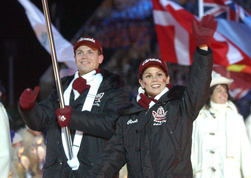 Rick Egan  |  Tribune file photo

David Pelletier and Jamie Salé, of Canada wave to the crowd during the Closing Ceremony.