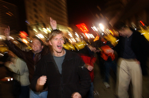 Rick Egan  |  Tribune file photo 

With chants of USA! USA! Olympic revelers scatter as police march east on 200 South trying to clear Main Street early Sunday morning, Feb. 24, 2002.