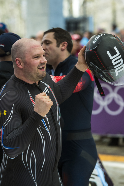 KRASNAYA POLYANA, RUSSIA  - JANUARY 23:
USA's pilot Steven Holcomb celebrates after the four-man bobsled at Sanki Sliding Center during the 2014 Sochi Olympics Sunday February 23, 2014. They won the bronze medal with a cumulative time of 3:40.99. 
(Photo by Chris Detrick/The Salt Lake Tribune)