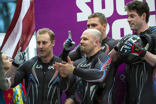 KRASNAYA POLYANA, RUSSIA  - JANUARY 23:
USA's Steven Holcomb, Chris Fogt, Curtis Tomasevicz, and Steve Langton, celebrate after the four-man bobsled at Sanki Sliding Center during the 2014 Sochi Olympics Sunday February 23, 2014. They won the bronze medal with a cumulative time of 3:40.99. 
(Photo by Chris Detrick/The Salt Lake Tribune)
