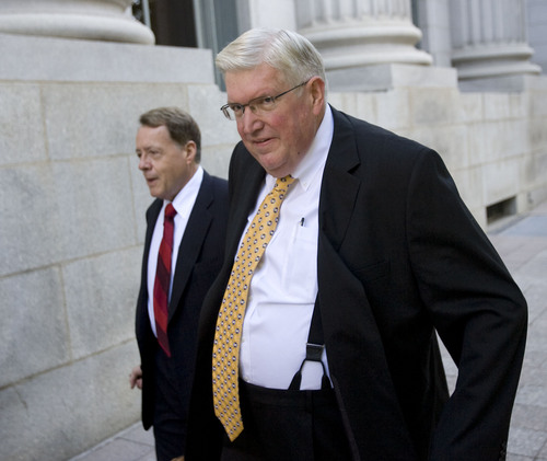 Al Hartmann  |  Tribune file photo
Dewey C. MacKay, right, a Brigham City doctor charged with illegally prescribing millions of pain pills, walks with his lawyer, Peter Stirba, to federal court in Salt Lake City.