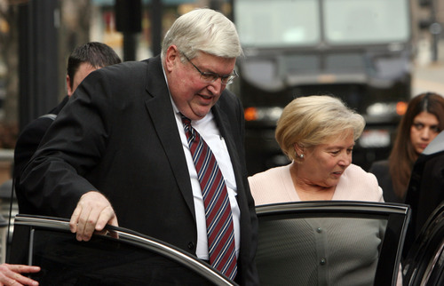Steve Griffin  |  The Salt Lake Tribune
Dewey C. MacKay and his wife, Kathleen MacKay, get into a car waiting outside the Frank E. Moss U.S. Courthouse in Salt Lake City on Monday Dec. 19, 2011, following sentencing hearing for charges related to prescribing more than 1.9 million hydrocodone pills and nearly 1.6 million oxycodone pills between June 1, 2005, and Oct. 30, 2009. His attorney Peter Stirba is at right.