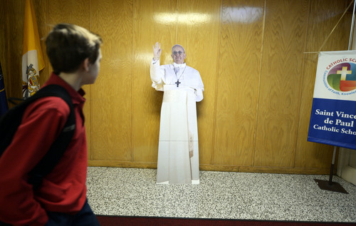 Francisco Kjolseth  |  The Salt Lake Tribune
A life-size cardboard cutout of Pope Francis greets students arriving at St. Vincent de Paul Catholic School on Thursday morning, Feb. 20, 2014. This "Pope Francis" gets moved around a bit but can typically be found near the office at the school.