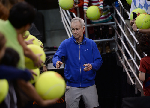 Steve Griffin  |  The Salt Lake Tribune


John McEnroe signs giant tennis balls during the Champions Challenge tournament, a 12-city tour, at EnergySolutions Arena Tuesday night. in Salt Lake City, Utah Wednesday, February 26, 2014.