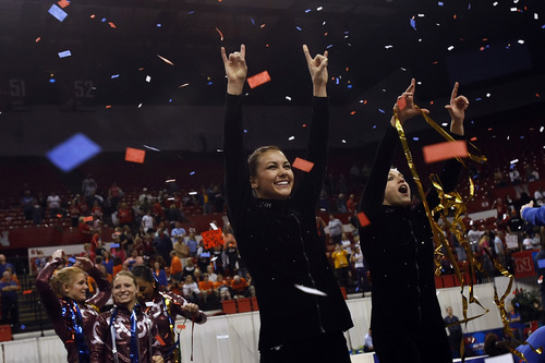 Utah's Kristina Baskett, left, and Daria Bijak celebrate with other gymnasts at the conclusion of the NCAA Gymnastics Championships being held at the University of Nebraska at Lincoln.

Chris Detrick/The Salt Lake Tribune