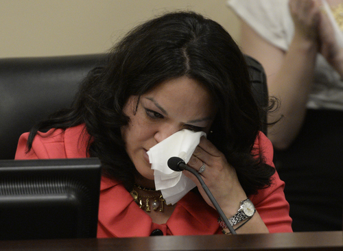 Rick Egan  | The Salt Lake Tribune 

Sen. Luz Robles wipes a tear after an emotional speech at the first-ever open, public conversation between members of the  LGBT community and state lawmakers sponsored by Sens. Steve Urquhart, R-St. George and Jim Dabakis, D-Salt Lake Cityaway .