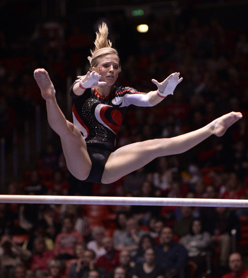 Al Hartmann  |  The Salt Lake Tribune 
University of Utah's Hailee Hansen has a look of concern as she looks downwards for a grab on the uneven parallel bars in a gymnastics meet against the University of Washington at the Huntsman Center Friday February 28. On her decent to the lower bar she failed to keep her grip and fell on this routine.