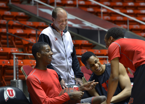 Scott Sommerdorf   |  The Salt Lake Tribune
Utah trainer Trevor Jameson jokes with Utah players Delon Wright, Princeton Onwas, and Brandon Taylor, right, during an informal practice, Thursday, Feb. 27, 2014. Jameson is battling a rare form of bone marrow cancer, and in the months ahead will need a bone marrow transplant.