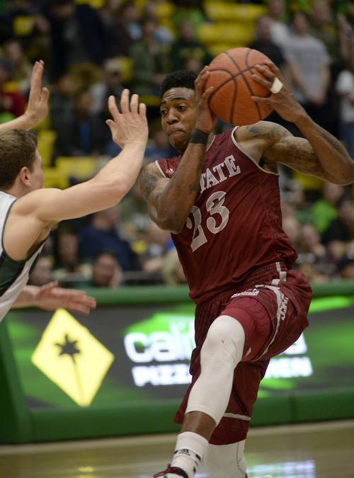 Francisco Kjolseth  |  The Salt Lake Tribune
New Mexico State Aggies guard Daniel Mullings (23) drives the ball down court against UVU in game action at Utah Valley University in Orem on Thursday, Feb. 27, 2014.