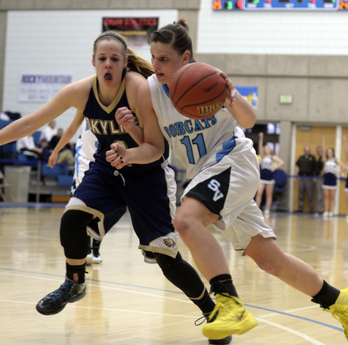 Rick Egan  | The Salt Lake Tribune 


Lindsey Jensen (11), Sky View drives to the hoop, as Sydnee Taylor (4), Skyline defends, in prep girls state basketball action, Skyline vs. Sky View, Monday, February 24, 2014.