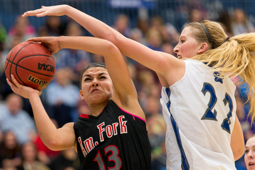 Trent Nelson  |  The Salt Lake Tribune
American Fork's Taylor Moeaki puts up a shot, defended by Fremont's Amanda Wayment as Fremont defeats American Fork High School in the 5A girls high school basketball tournament's state championship game in Taylorsville, Saturday, March 1, 2014.