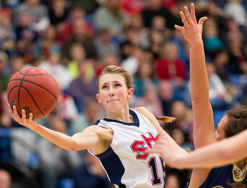 Trent Nelson  |  The Salt Lake Tribune
Springville's Kate Hullinger puts up a shot around Skyline's Hillary Weixler as Springville faces Skyline High School in the 4A girls high school basketball tournament state championship game in Taylorsville, Saturday, March 1, 2014.
