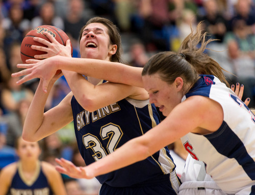 Trent Nelson  |  The Salt Lake Tribune
Skyline's Camryn Dellos is fouled by Springville's Brooke Wheeler as Springville faces Skyline High School in the 4A girls high school basketball tournament state championship game in Taylorsville, Saturday, March 1, 2014.