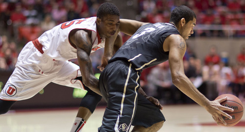 Lennie Mahler  |  The Salt Lake Tribune
Utah's Delon Wright takes an elbow to the head after he lost the ball to Colorado's Xavier Talton in the first half of a game at the Huntsman Center, Saturday, March 1, 2014.